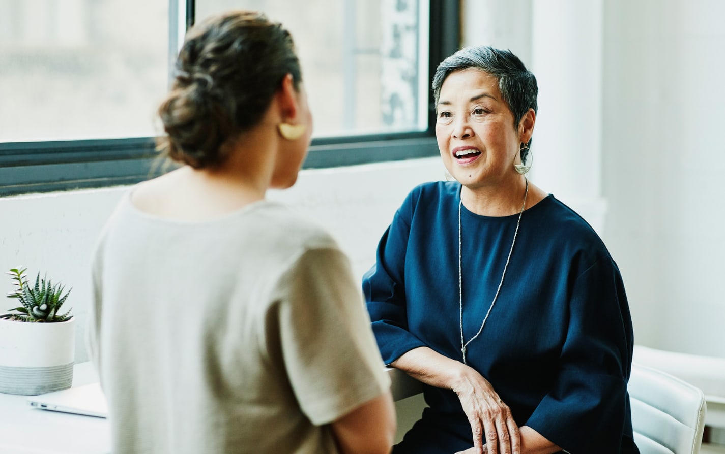 woman talking to Licensed Insurance Agent